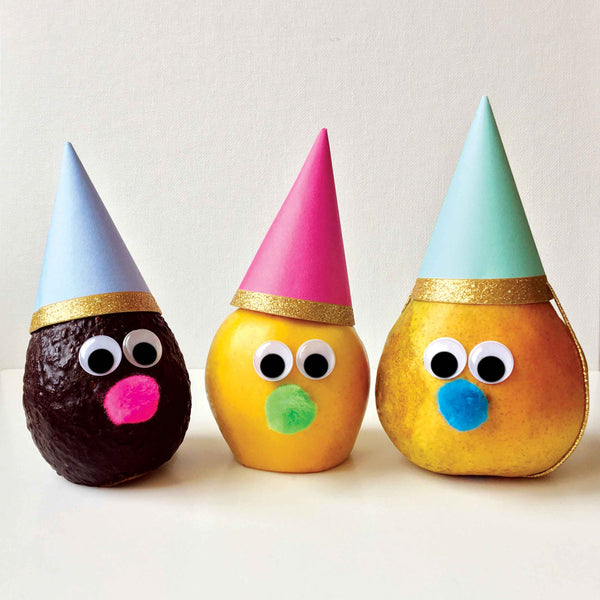 Fruits and veggies with party hats