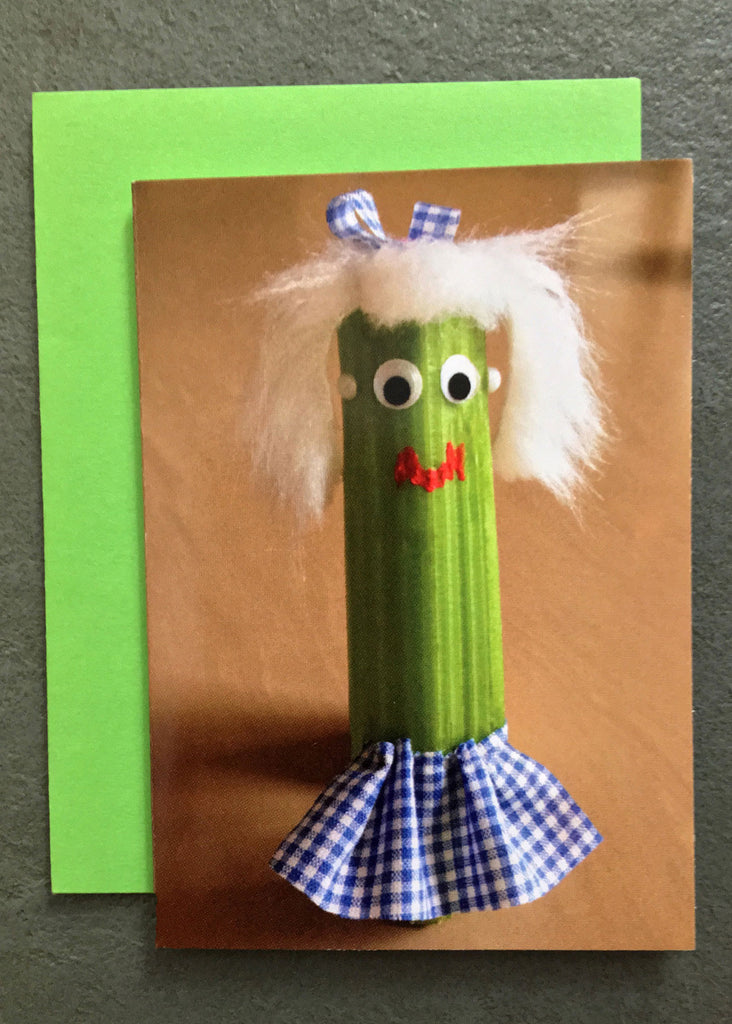 Celery character in a skirt on gift enclosure card