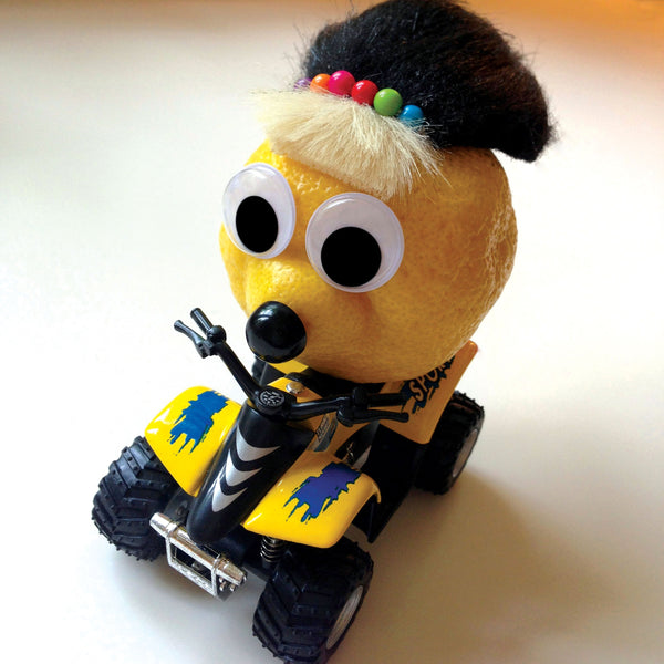 Lemon character riding a ATV
