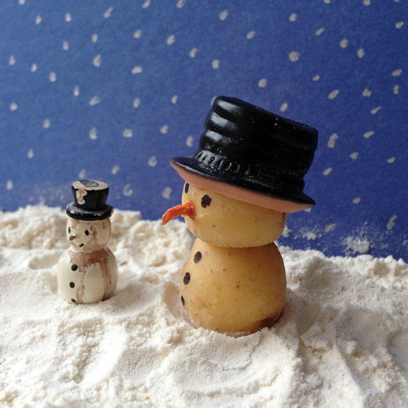 Potato snowman characters in winter